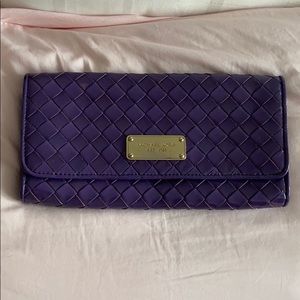 Micheal Kors purple lattice clutch